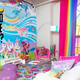 Illustration for article titled Would You Live in the Rainbow Explosion That Is the Hotels.com Lisa Frank SponCon Flat?